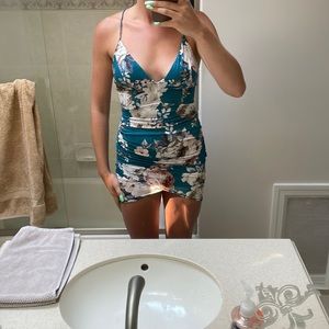 Floral mini dress with asymmetrical bottom